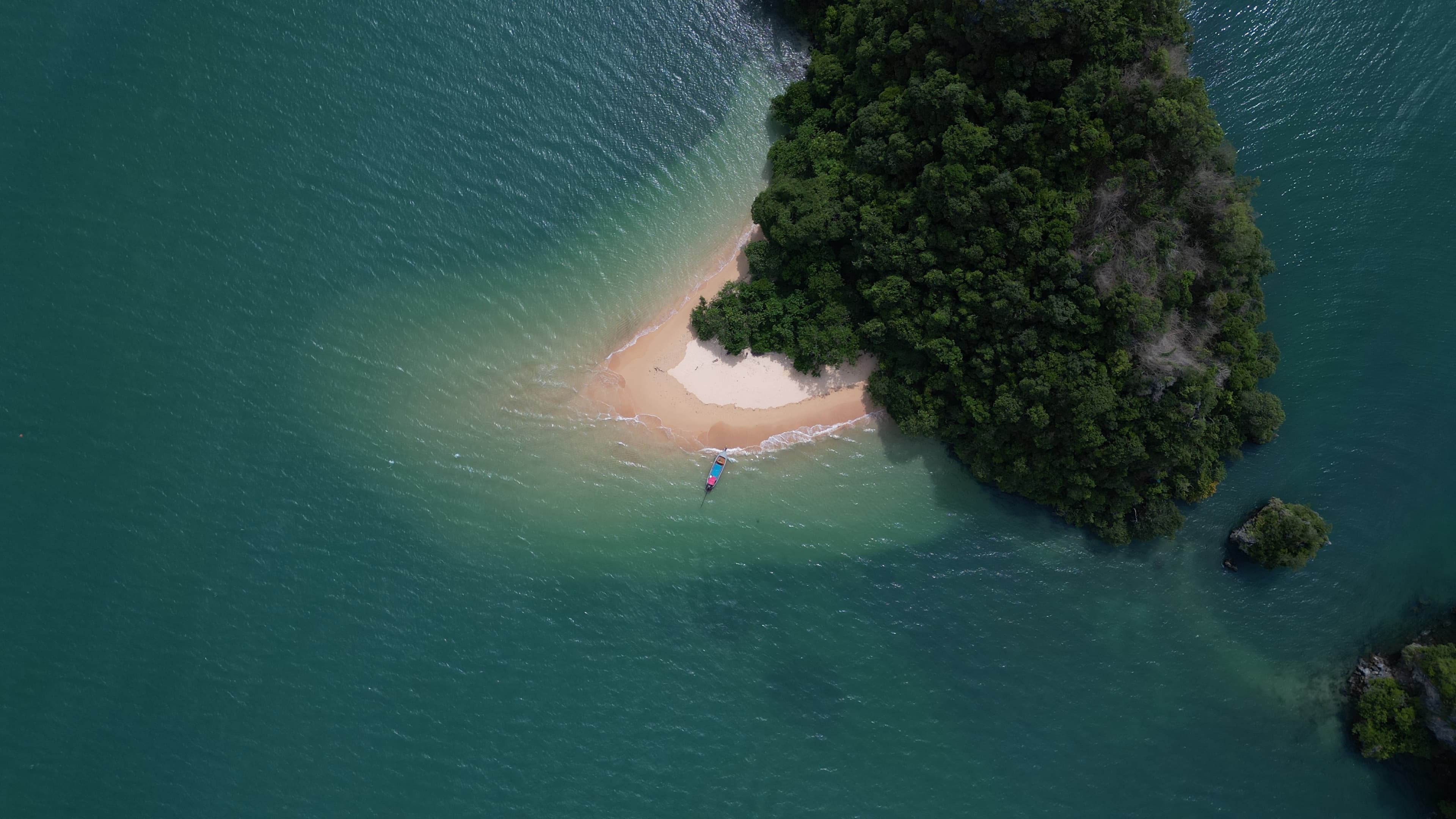 Hidden tropical beach with shallow clear water
