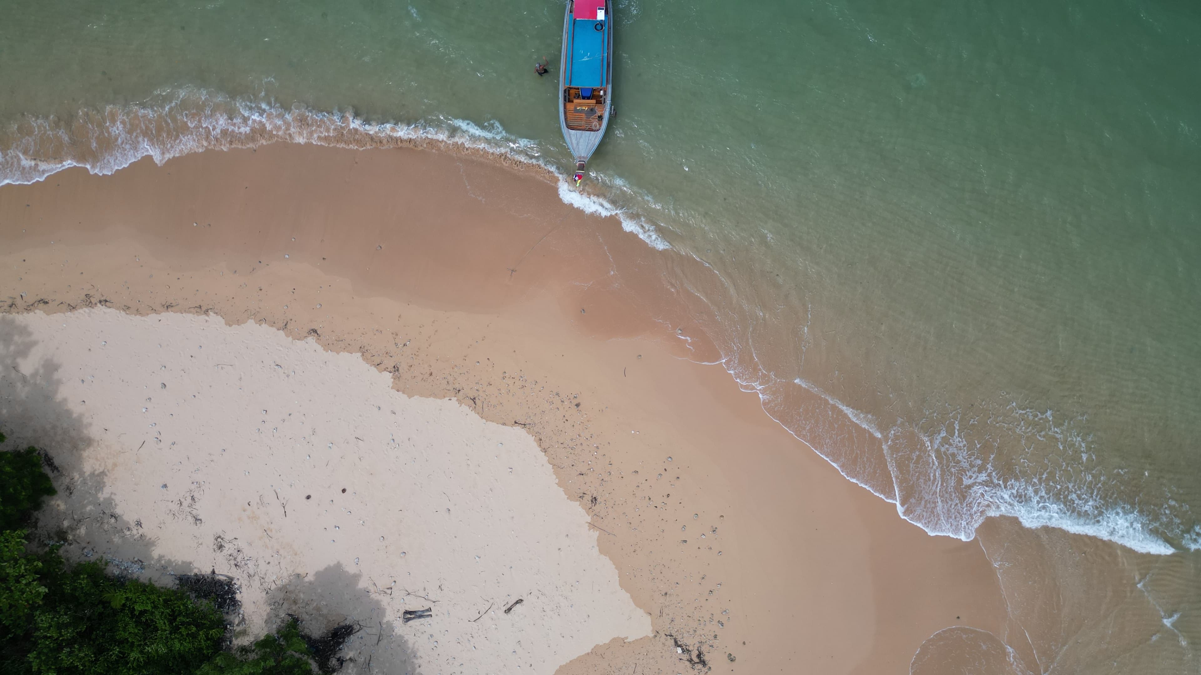 Aerial beach stop on a combined island tour